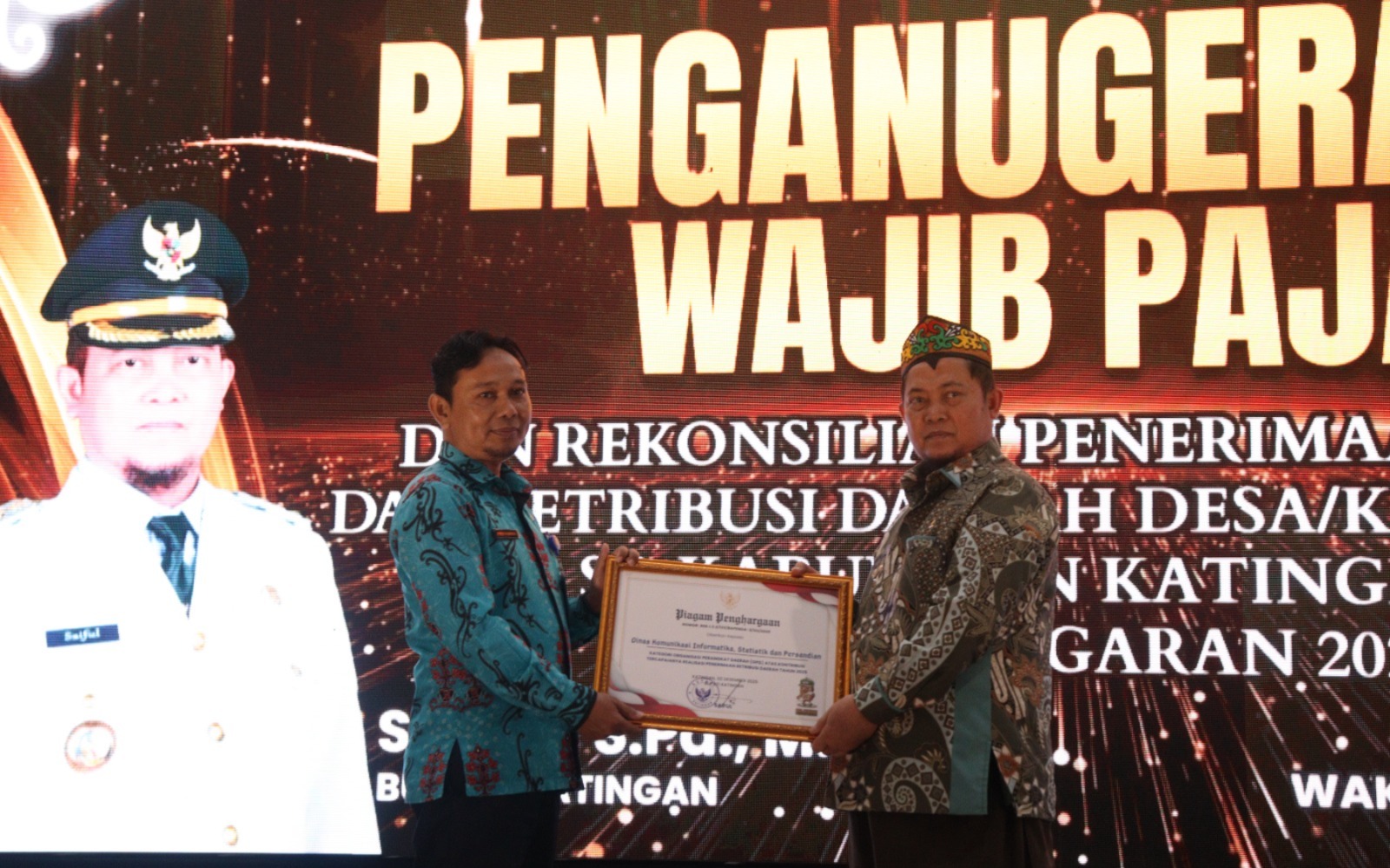 PENGANUGERAHAN WAJIB PAJAK DAN REKONSILIASI PENERIMAAN PAJAK SERTA RETRIBUSI DESA/KELURAHAN TAHUN 2025